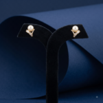 Lustrous Curve Pearl Earrings - Image 2